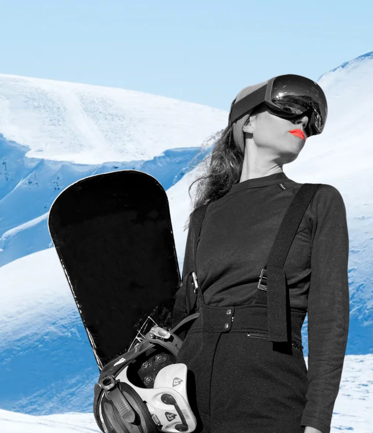 Snowboarder wearing Barreltopia lip protection in the mountains